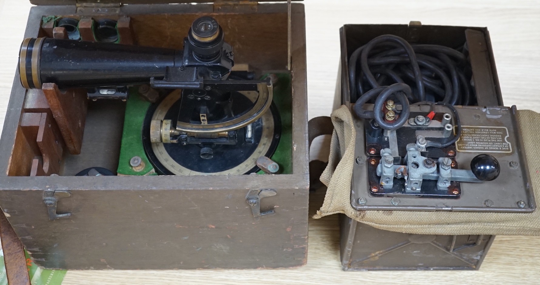 A WW2 range-finder, 33cms wide x 33cms high, together with a morse code short range daylight signalling set, both cased